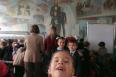 Школа Ленина в Ульяновске. На стене - портреты молодого Ленина, его отца и его брата Александра, который был казнен за подготовку покушения на жизнь царя